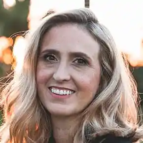 Sarah Chen, Lead Chauffeur, pictured in a professional portrait.