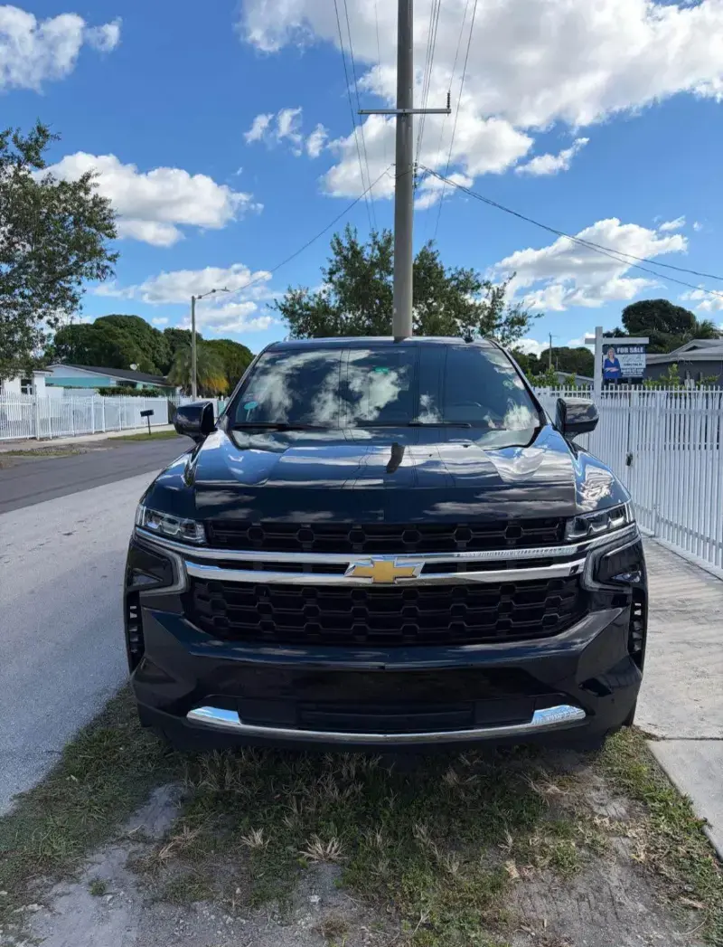 Black Chevrolet SUV parked in an outdoor setting.