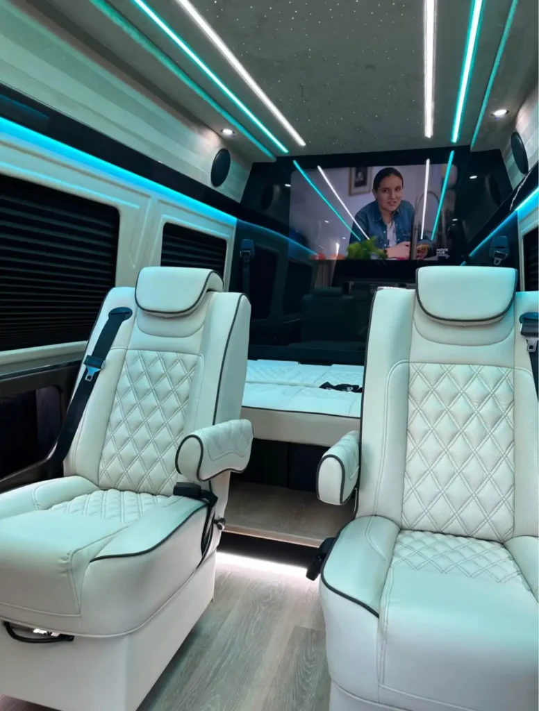 White luxury van interior with sofa seats for Luxury Car Service Miami