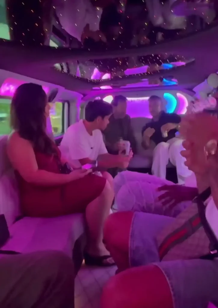 Black limousine luxury interior with ambient lighting and premium seating for VIP group celebration transportation